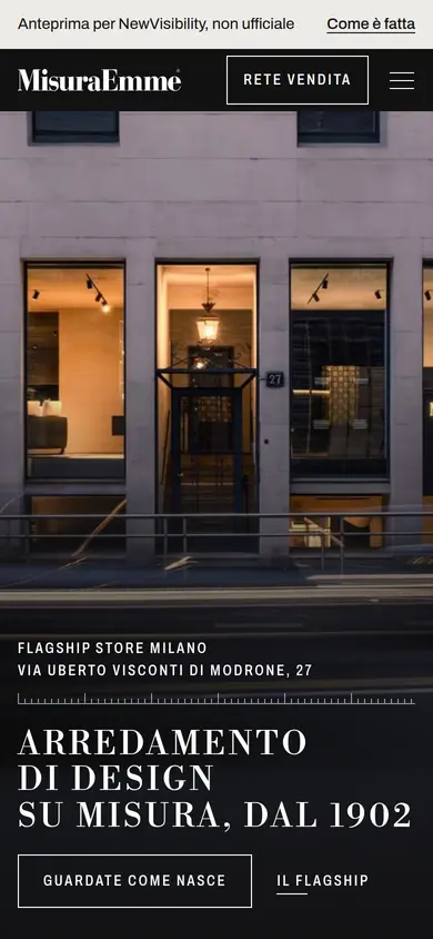 La prima schermata della home rifatta sul telefono: la facciata del flagship al tramonto e il titolo